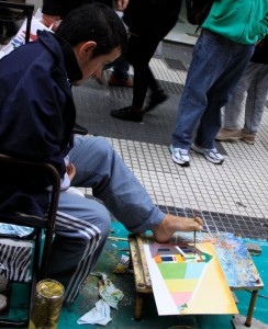 Man painting with his feet